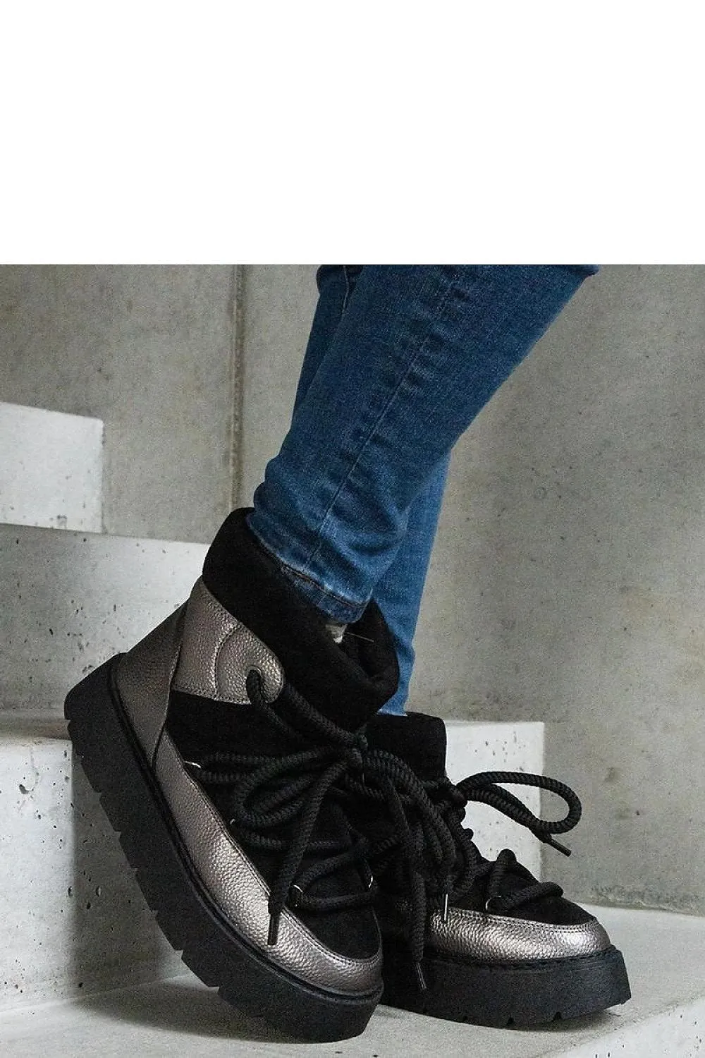 Beige snow boots on the platform